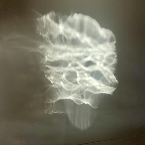 reflection on white wall