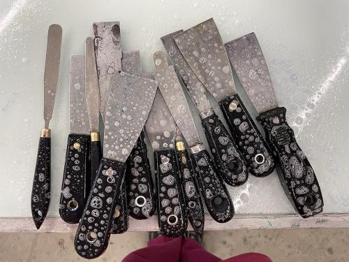 spatulas covered in soap