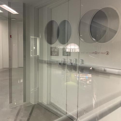 multiple reflections, white door